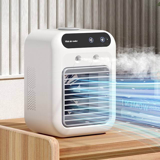 Summercool portable air cooler on a wooden table with refreshing mist
